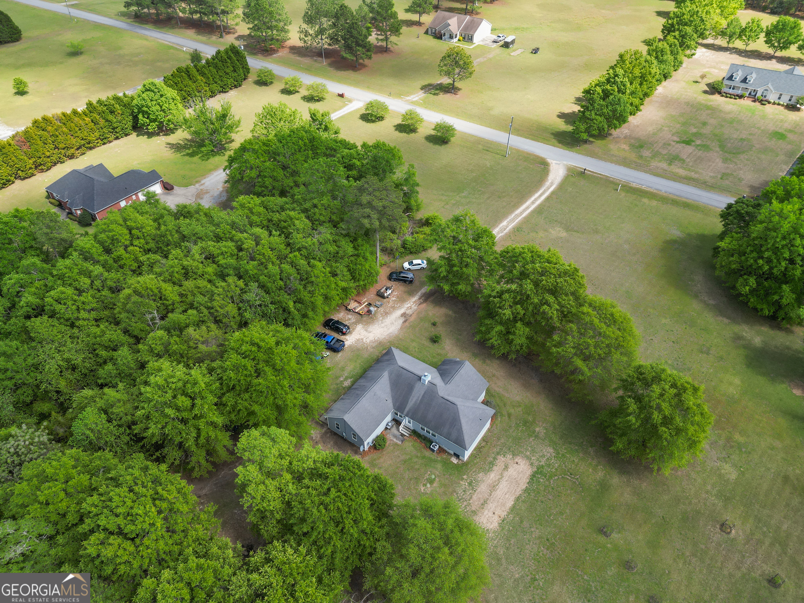 136 Quail Knoll Road Danville, GA 31017 - Photo 45 of 49 an aerial view of a house with a yard