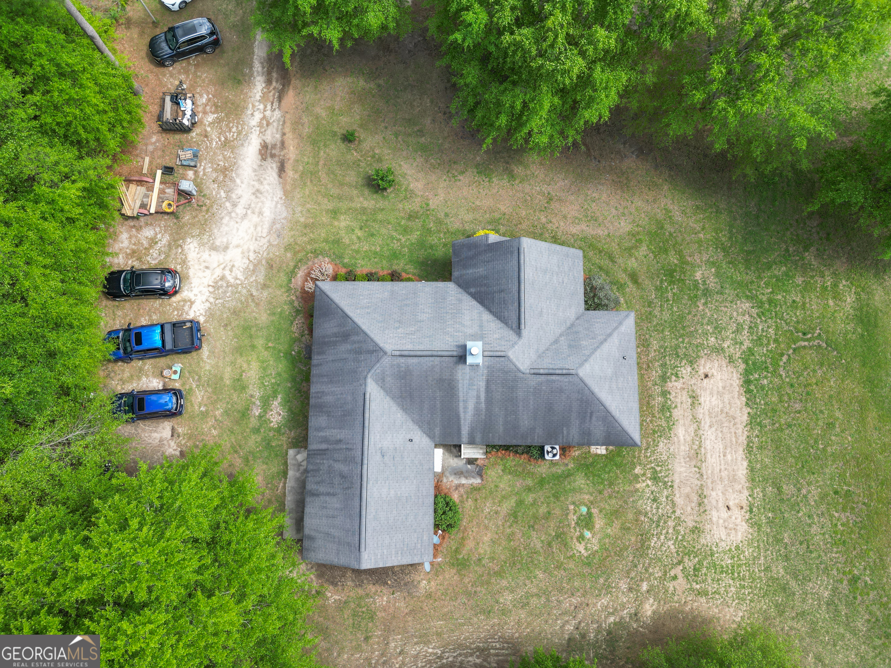 136 Quail Knoll Road Danville, GA 31017 - Photo 46 of 49 an aerial view of a house with a yard