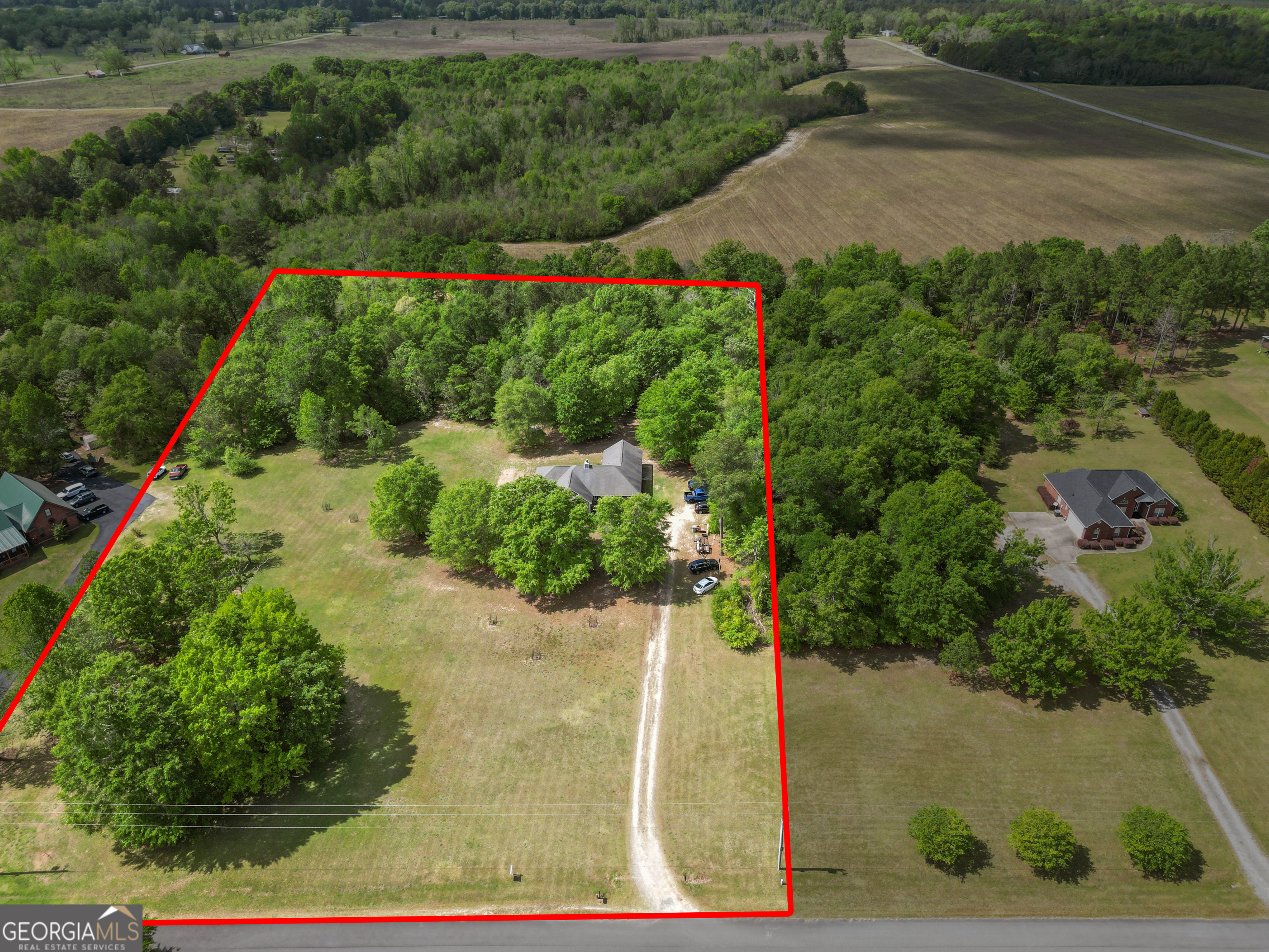 136 Quail Knoll Road Danville, GA 31017 - Photo 48 of 49 a view of a garden with a pathway