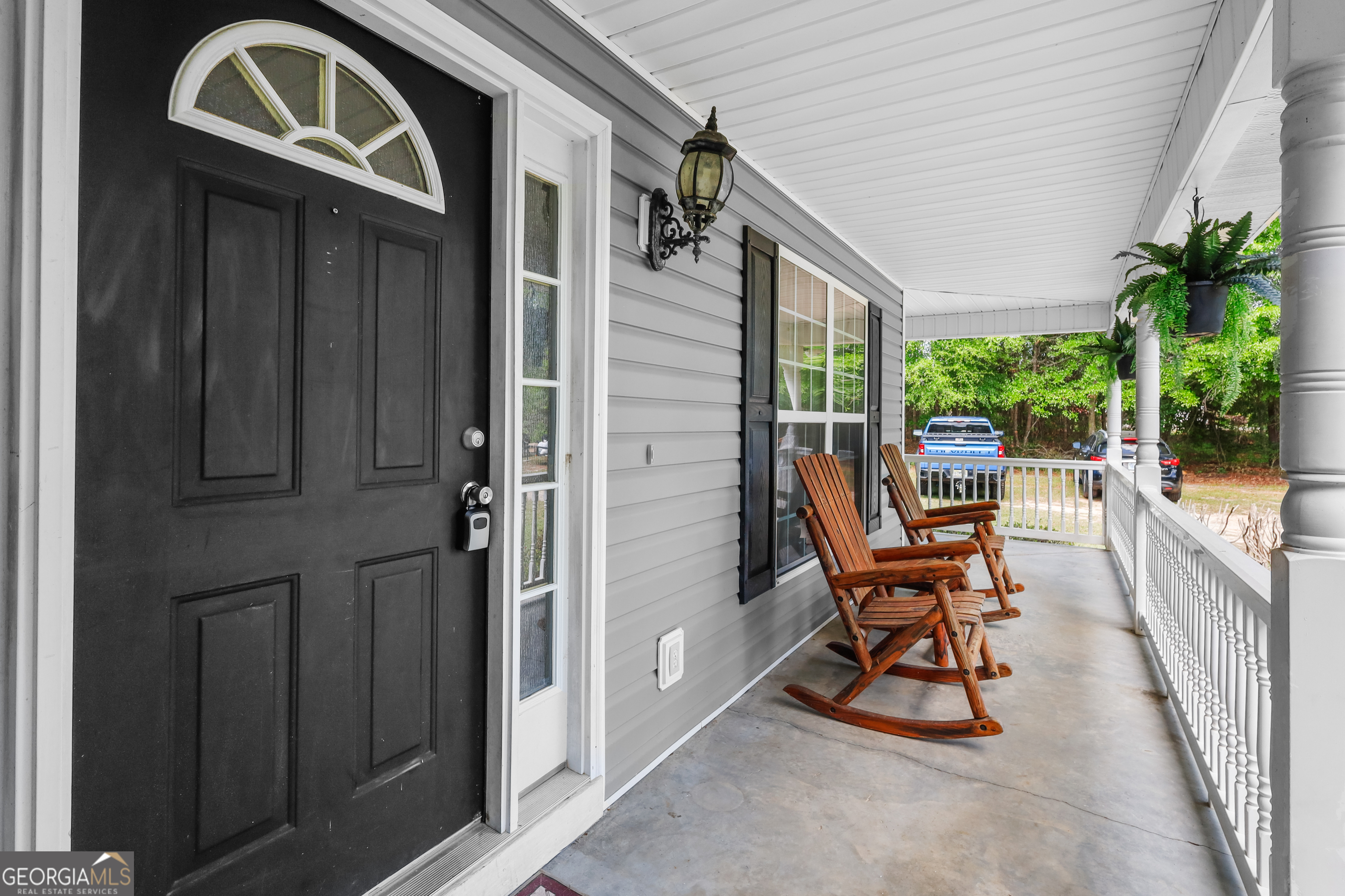 136 Quail Knoll Road Danville, GA 31017 - Photo 5 of 49 a view of a two chairs in the balcony