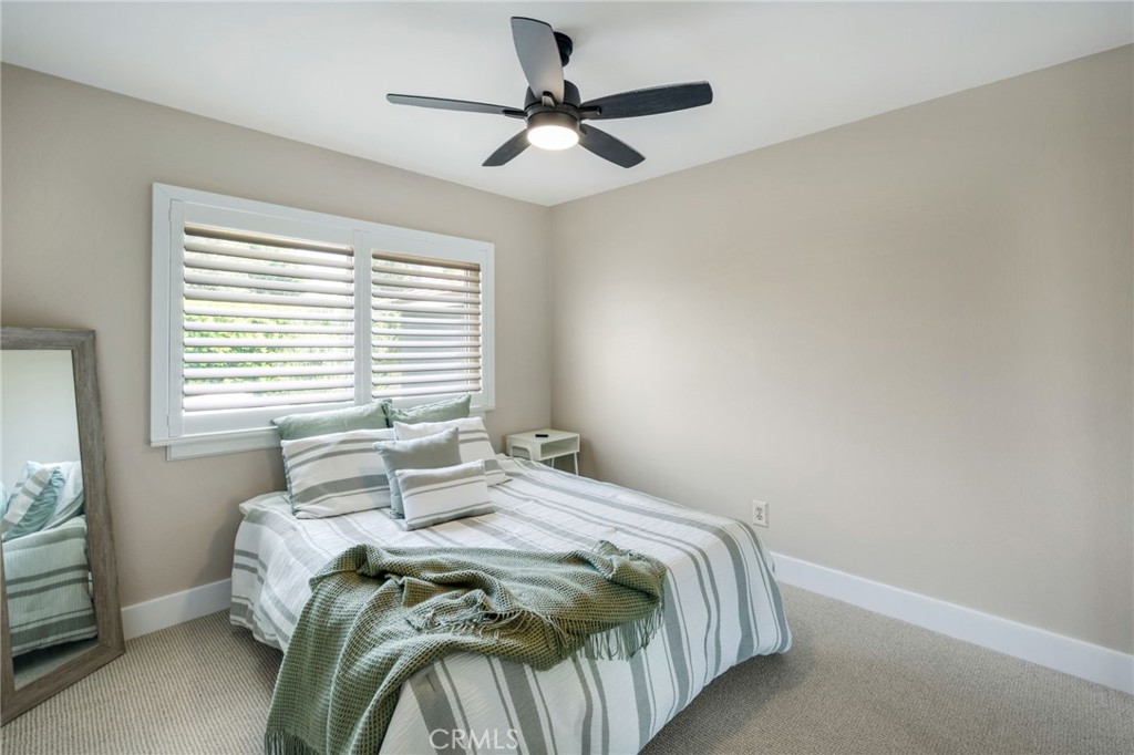109 Cinnamon Ridge Road Brea, CA 92821 - Photo 41 of 67 Upstairs guest bedroom including plantation shutters and ceiling fan with light and closet not shown.