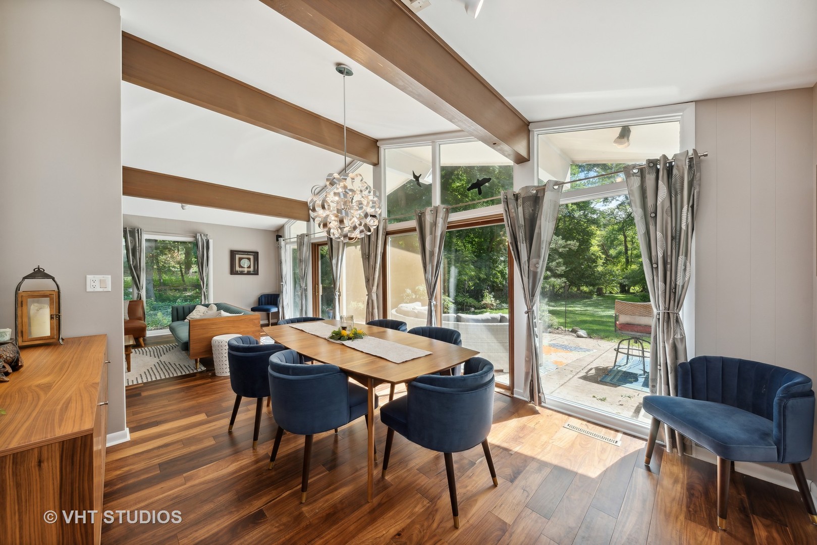 107 Trout Valley Road Trout Valley, IL 60013 - Photo 12 of 29 a view of a dining room with furniture wooden floor and chandelier