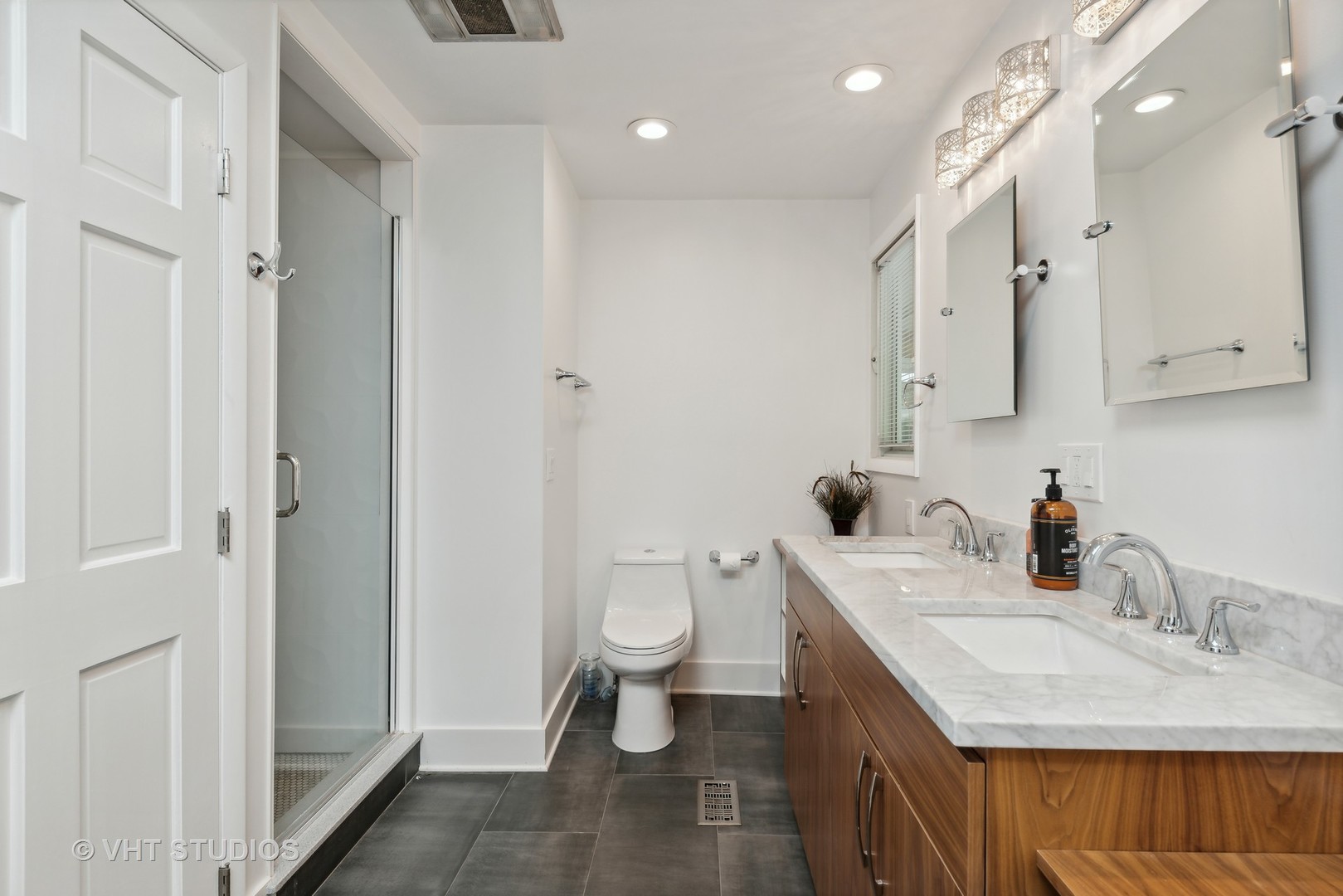 107 Trout Valley Road Trout Valley, IL 60013 - Photo 18 of 29 a bathroom with a sink a toilet and a large mirror