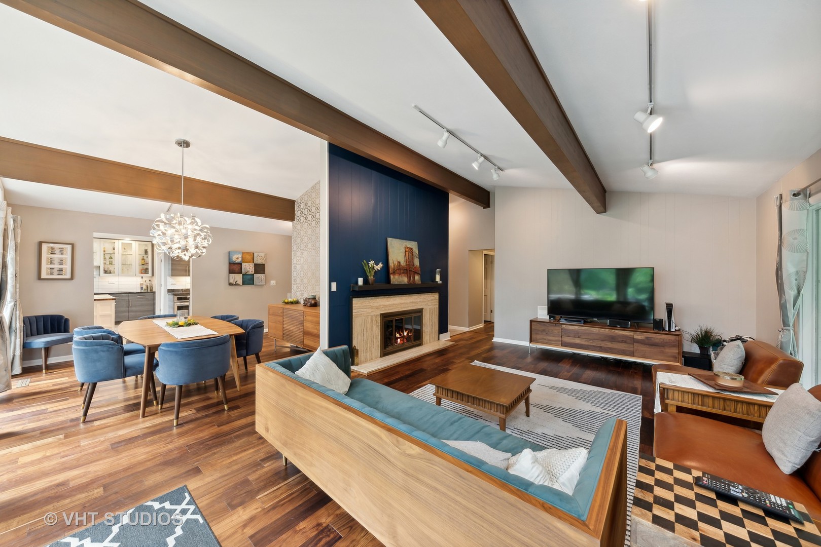 107 Trout Valley Road Trout Valley, IL 60013 - Photo 7 of 29 a living room with furniture a flat screen tv and a fireplace