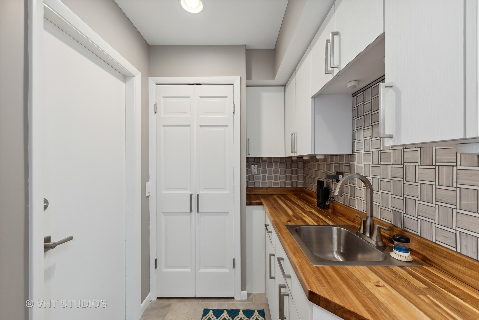 107 Trout Valley Road Trout Valley, IL 60013 - Photo 10 of 29 a kitchen with white cabinets and sink