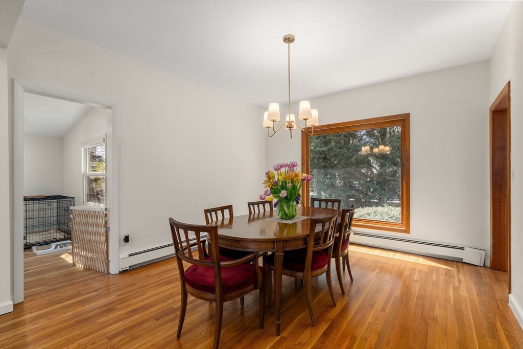 50 Mary Ellen Road Newton, MA 02468 - Photo 5 of 22 a view of a dining room with furniture window and wooden floor