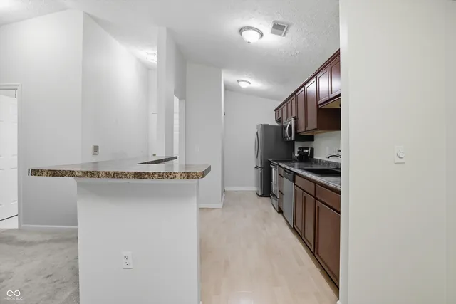 $240,000 | 11755 Beckham Court, Unit 206, Carmel, IN 46032