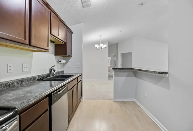 $240,000 | 11755 Beckham Court, Unit 206, Carmel, IN 46032