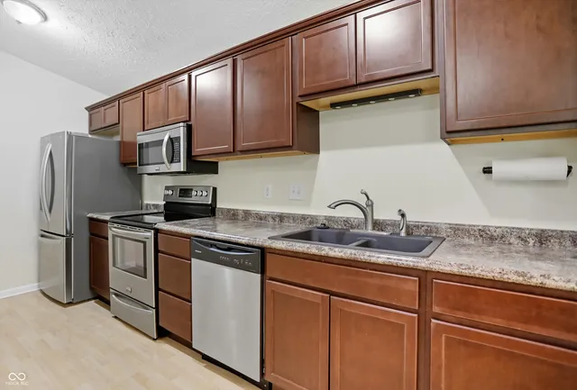 $240,000 | 11755 Beckham Court, Unit 206, Carmel, IN 46032