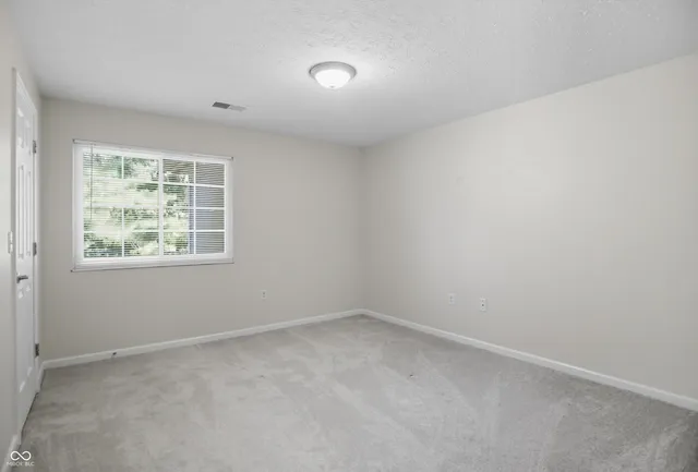 $240,000 | 11755 Beckham Court, Unit 206, Carmel, IN 46032