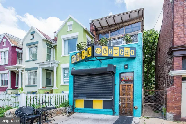 a front view of a building with street