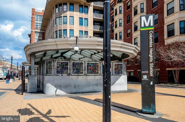 a view of a building with a street