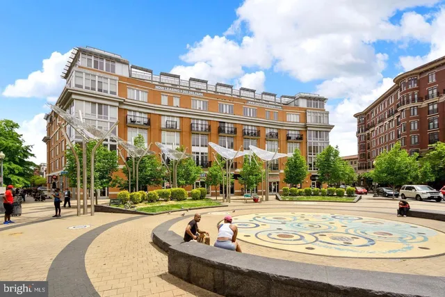 a view of a swimming pool with an ocean view