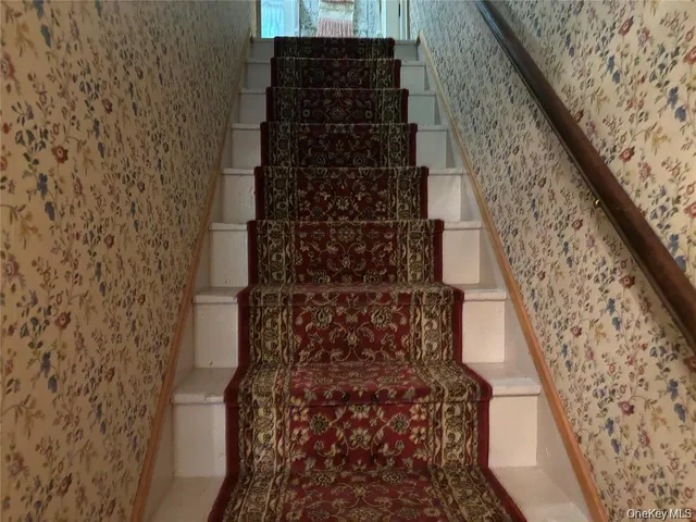 a bathroom with a shower and a shower curtain