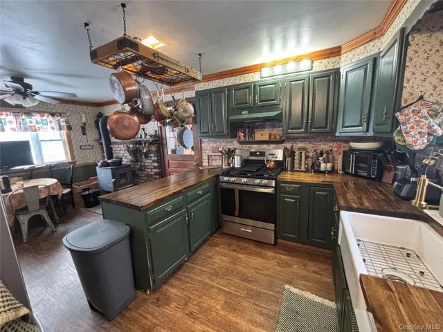 a room with lots of furniture and chandelier