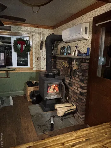 a spacious bedroom with a bed and a window in it