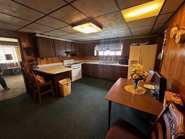 264 Duff Street Bobtown, PA 15315 - Photo 5 of 19 a kitchen with a sink a counter and chairs