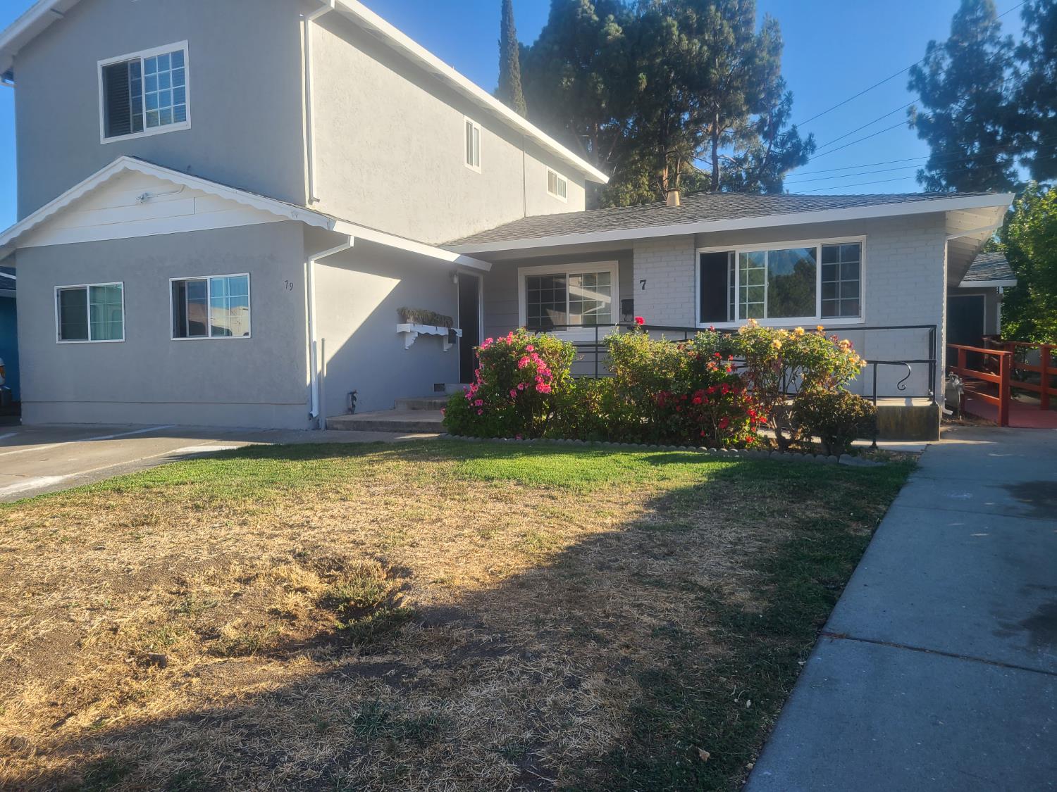 79 Heath Street Milpitas, CA 95035 - Photo 1 of 1 a front view of a house with garden
