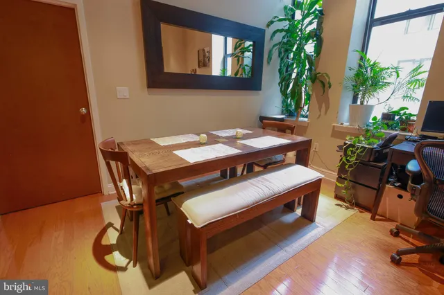 a view of a livingroom with furniture and a table