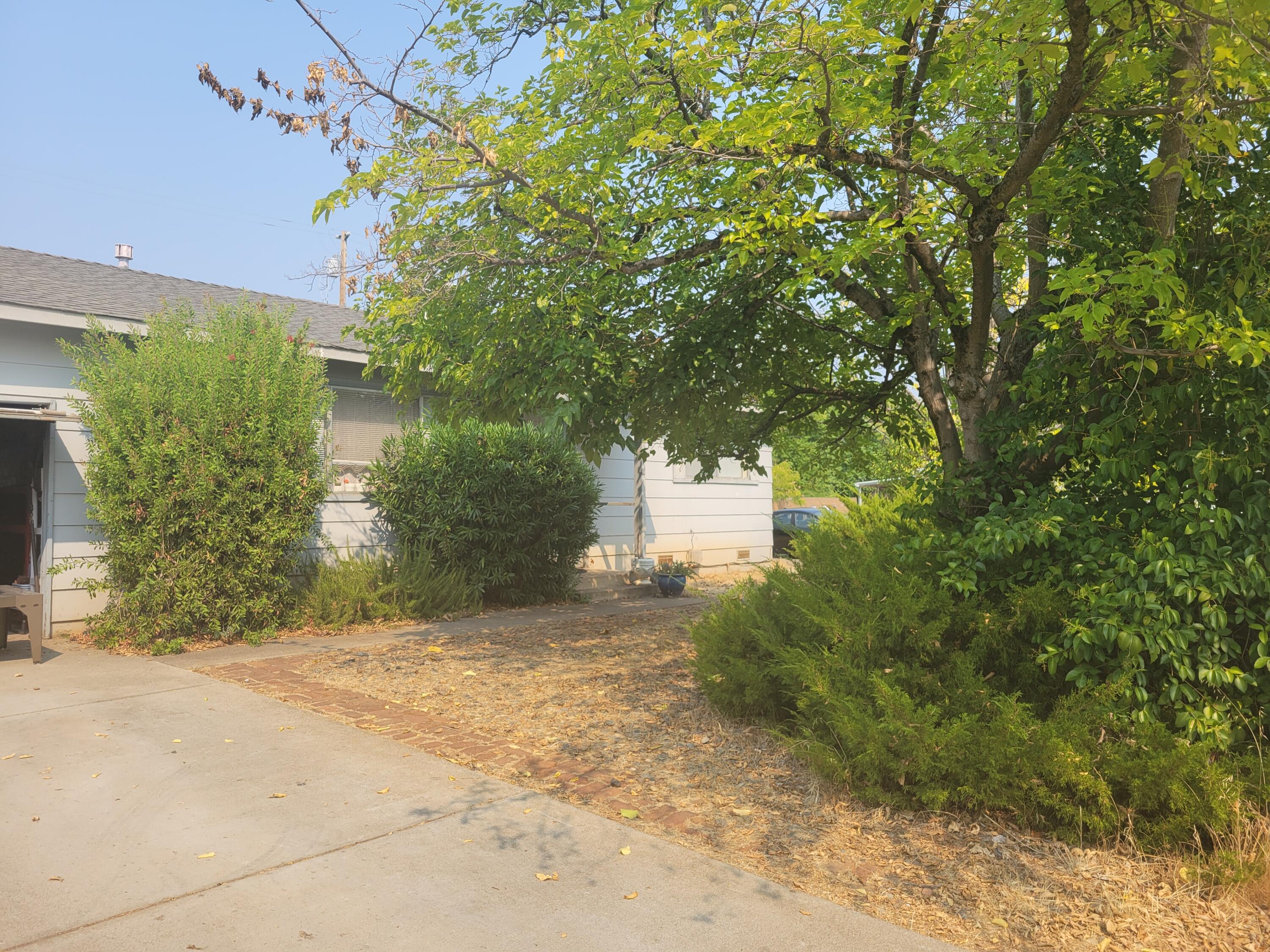 2490 Galaxy Way Redding, CA 96002 - Photo 2 of 30 a view of a back yard
