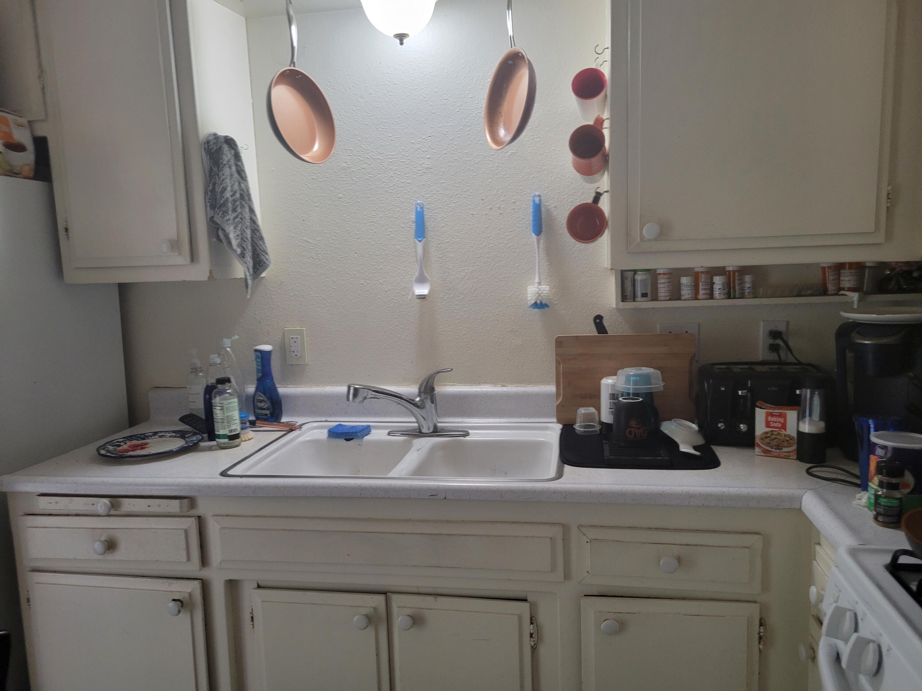 2490 Galaxy Way Redding, CA 96002 - Photo 21 of 30 a bathroom with a sink and a mirror