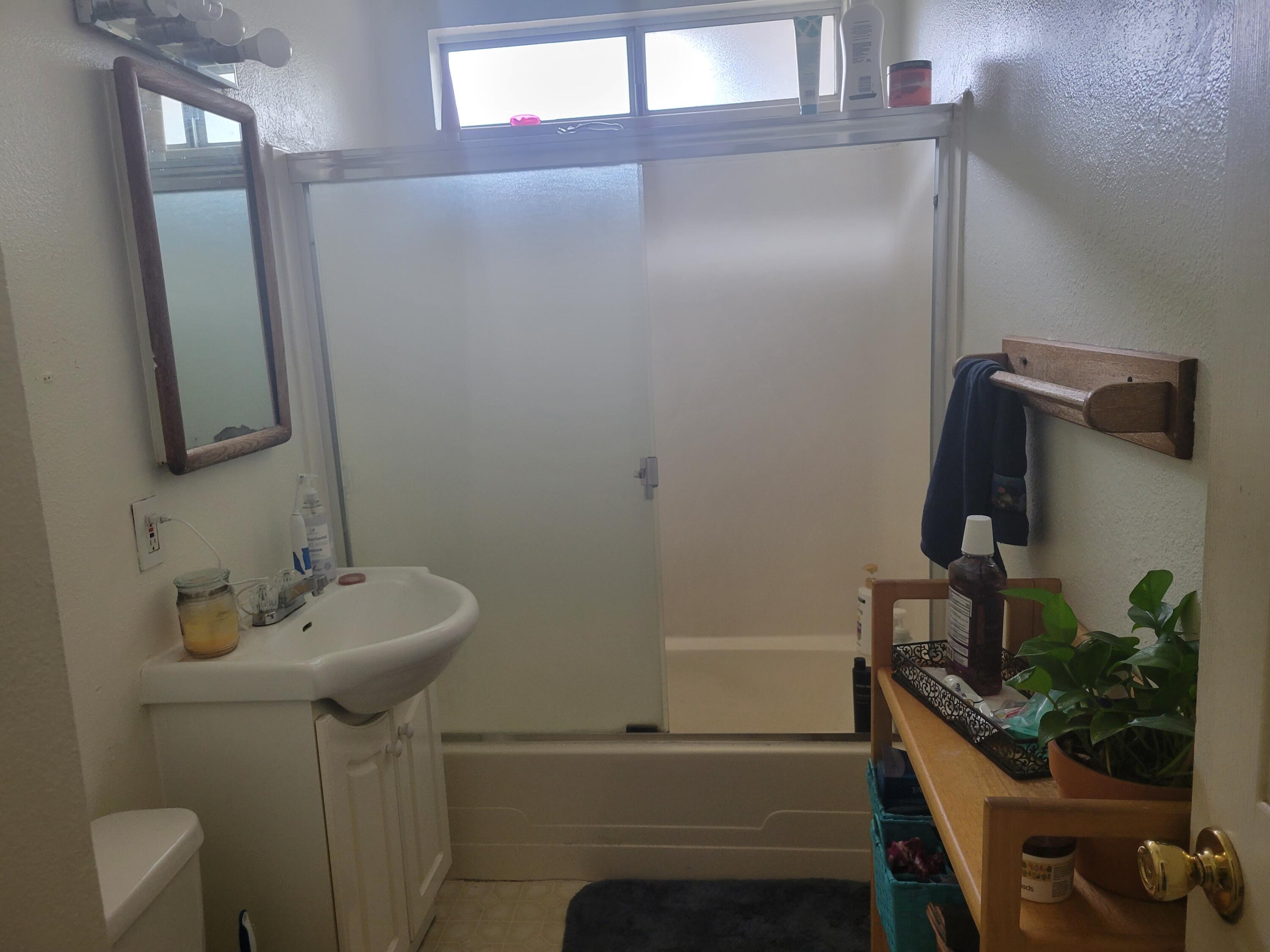 2490 Galaxy Way Redding, CA 96002 - Photo 9 of 30 a bathroom with a sink toilet and mirror