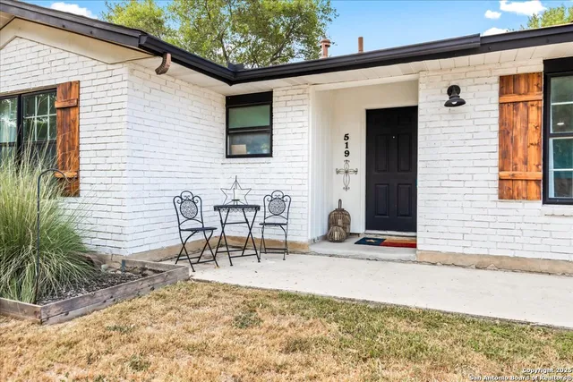 a view of a outdoor space with a patio