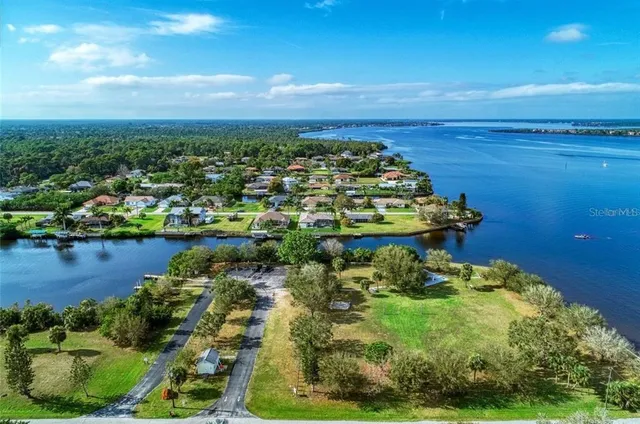a view of a lake with a city
