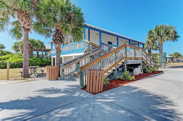 a view of house with outdoor space and stairs