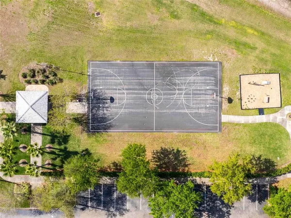 an aerial view of a house swimming pool and outdoor space