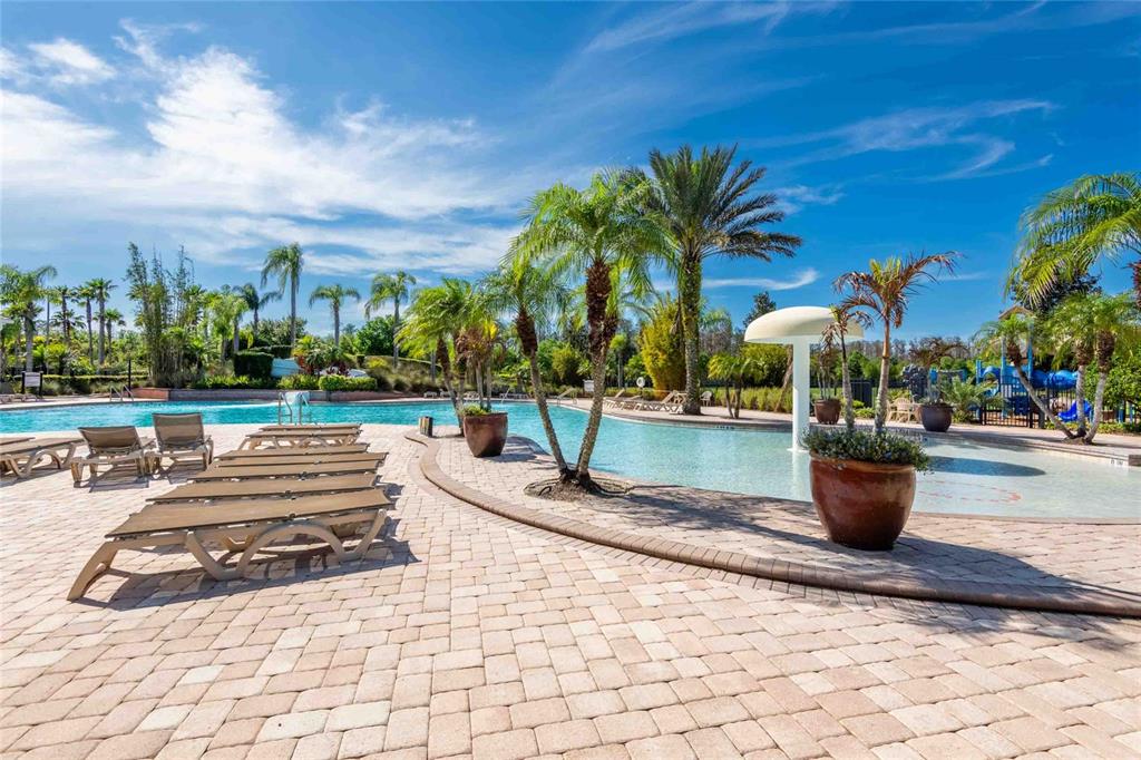 2814 Maple Brook Loop Lutz, FL 33558 - Photo 36 of 38 a view of swimming pool with outdoor seating and plants