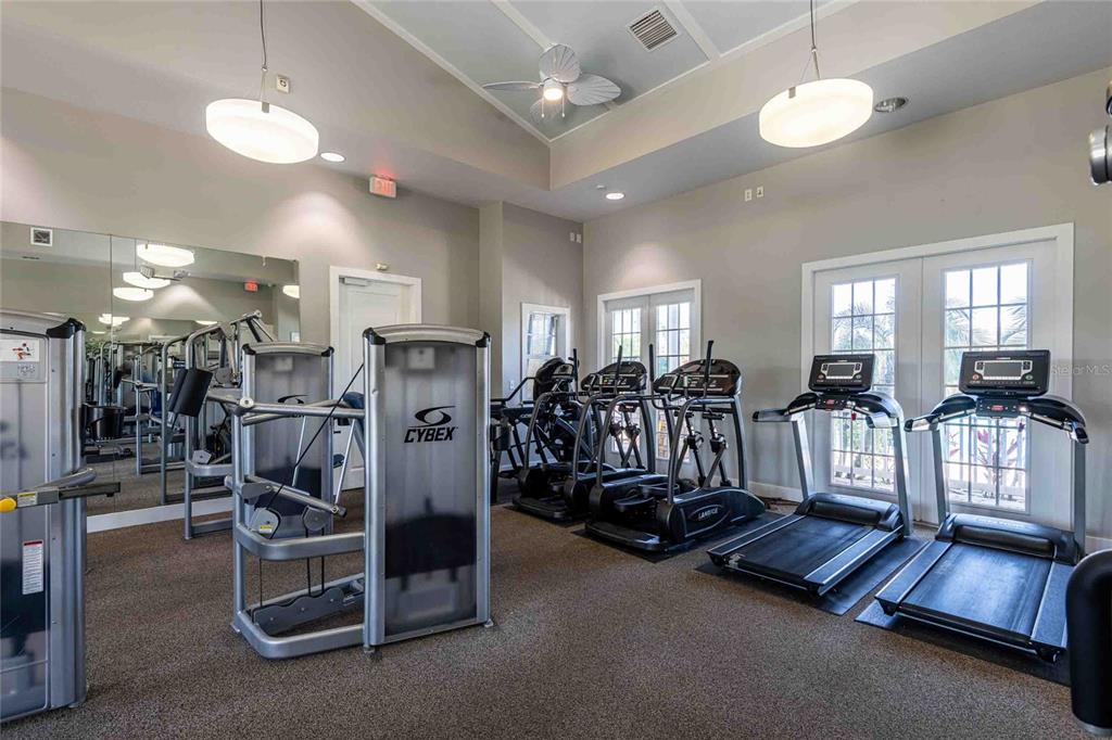 2814 Maple Brook Loop Lutz, FL 33558 - Photo 38 of 38 a view of a room with gym equipment