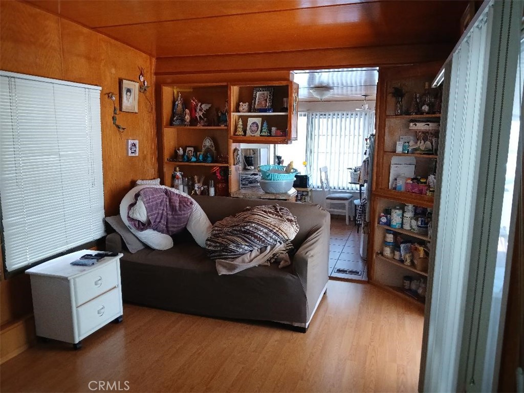 13645 5th Street, Unit 35 Yucaipa, CA 92399 - Photo 17 of 30 a living room with furniture and wooden floor