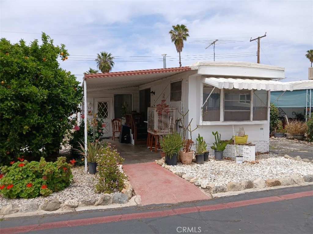 13645 5th Street, Unit 35 Yucaipa, CA 92399 - Photo 3 of 30 a view of a house with patio