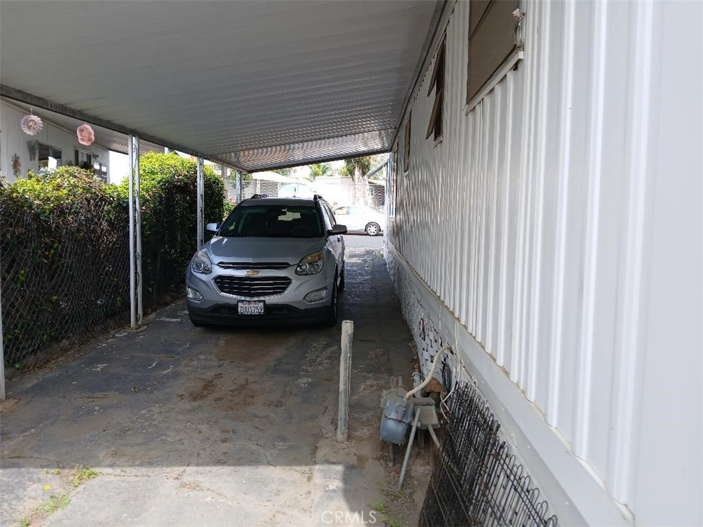 13645 5th Street, Unit 35 Yucaipa, CA 92399 - Photo 6 of 30 a view of car parked in garage
