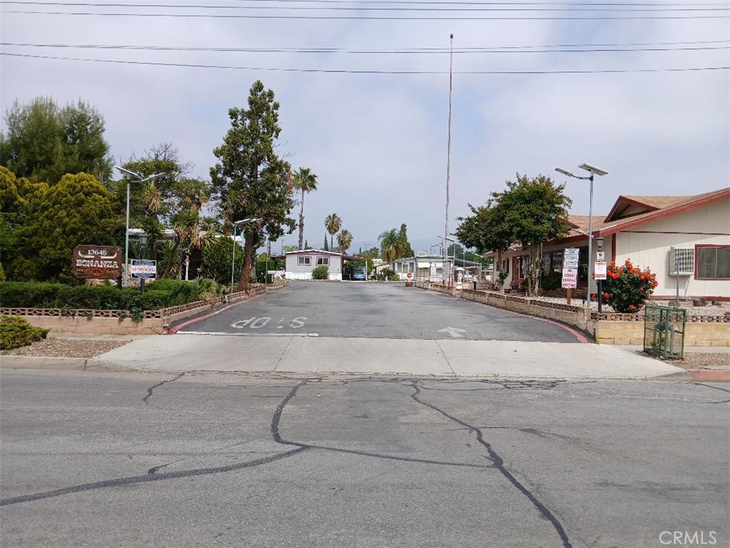 13645 5th Street, Unit 35 Yucaipa, CA 92399 - Photo 9 of 30 a view of a street with houses