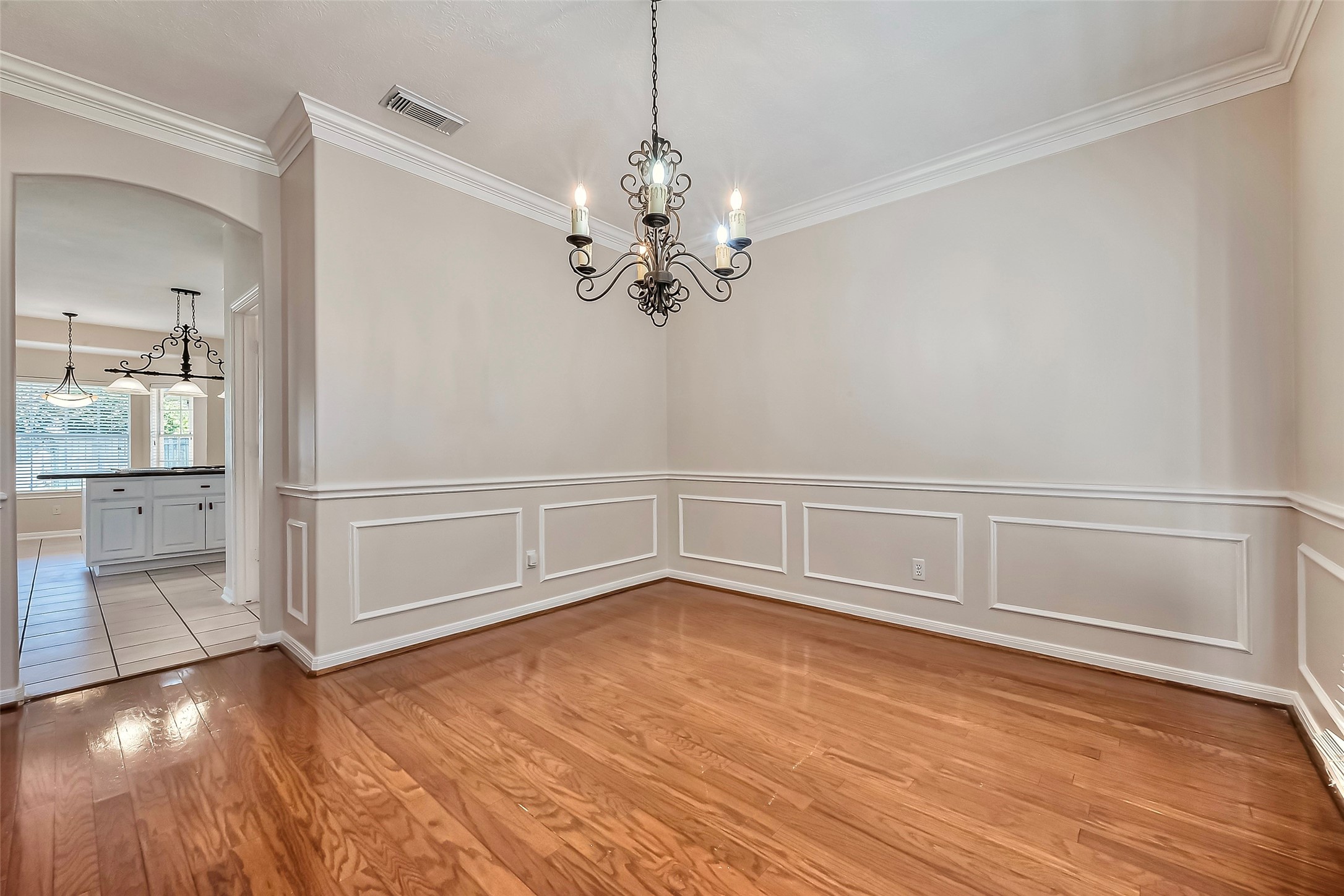 19 Calleston Court Sugar Land, TX 77479 - Photo 15 of 36 Formal dining room leads to kitchen
