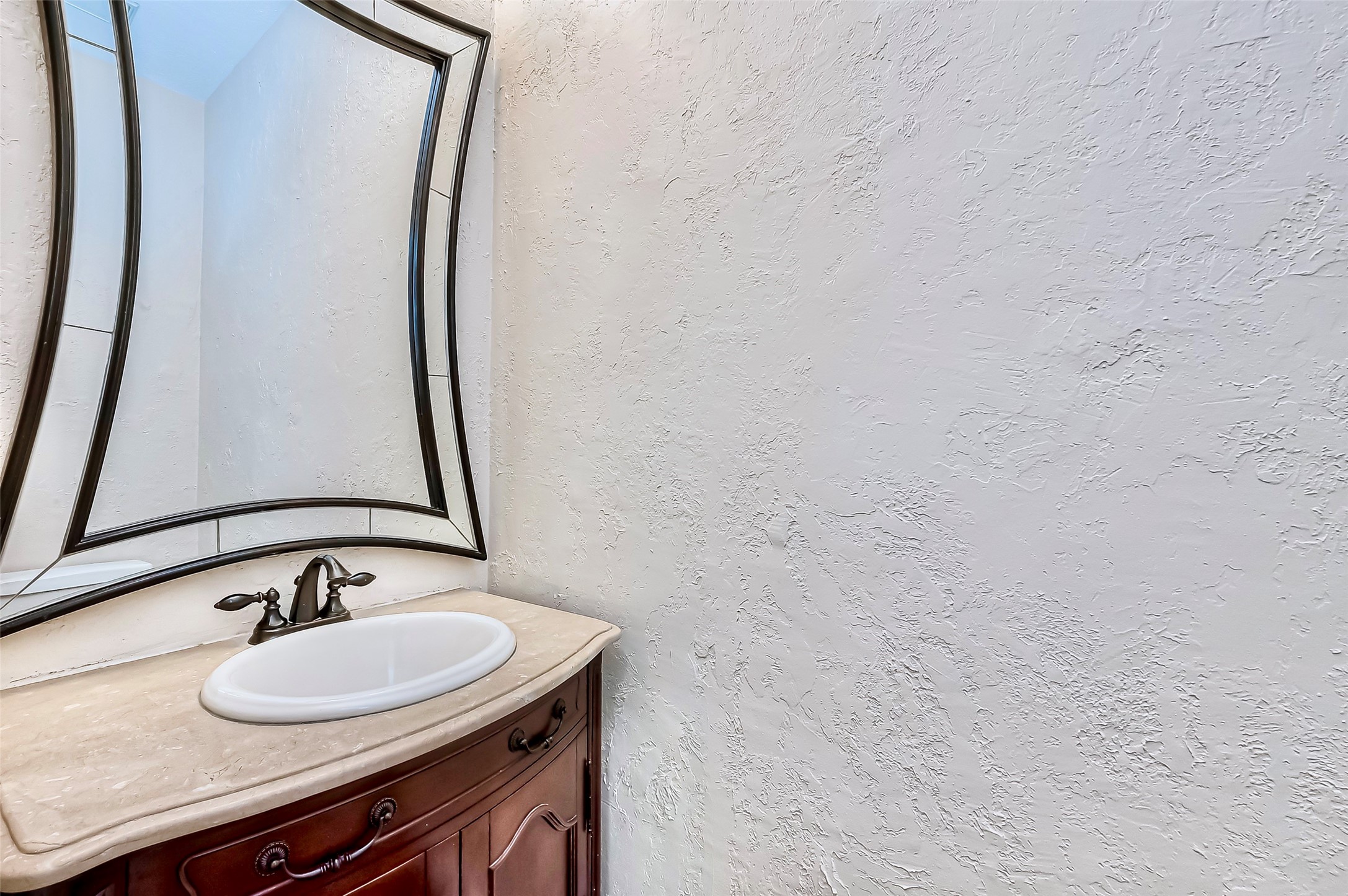 19 Calleston Court Sugar Land, TX 77479 - Photo 21 of 36 Half bathroom on the first floor