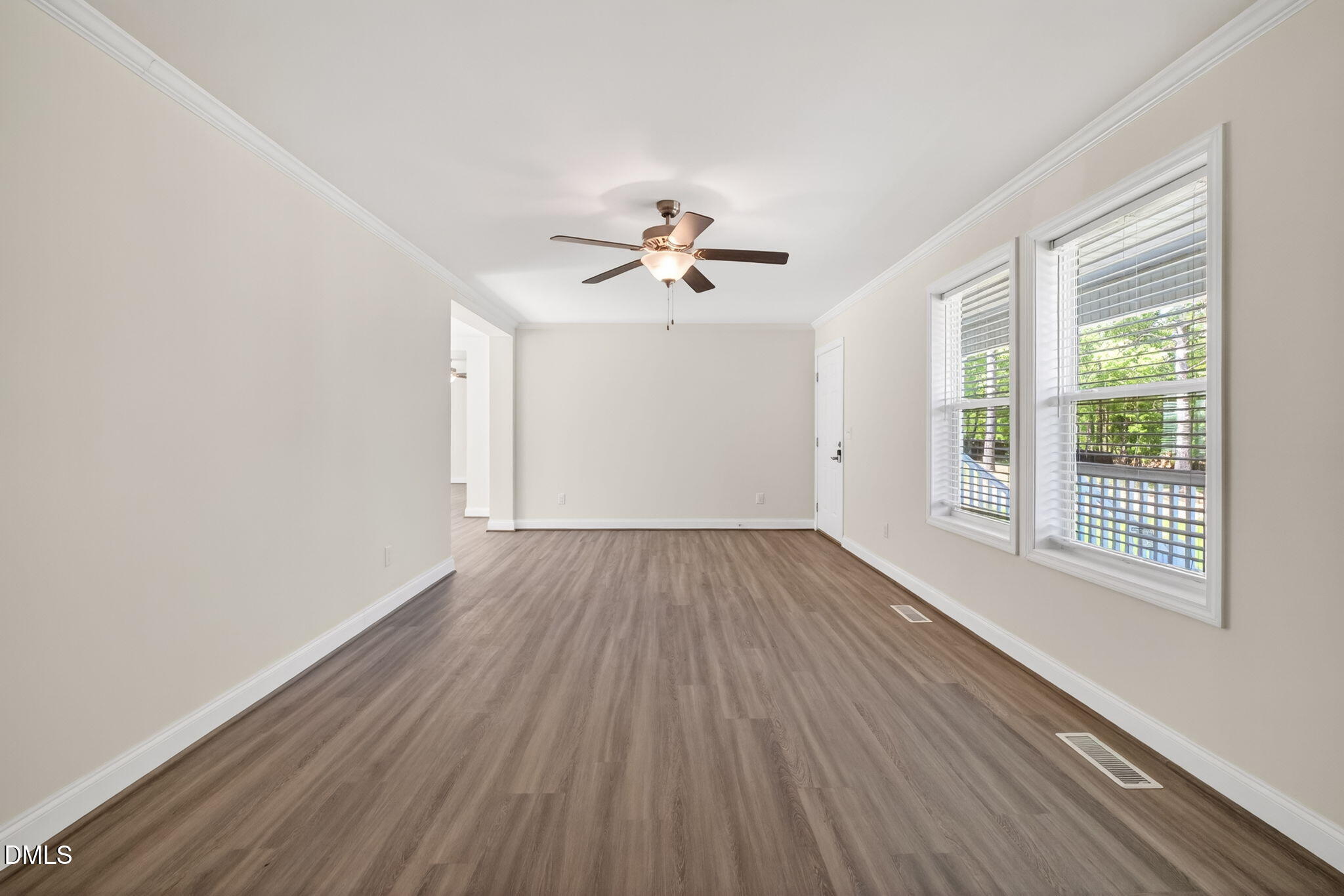 7122 Guess Road Hillsborough, NC 27278 - Photo 21 of 48 wooden floor in an empty room with a window