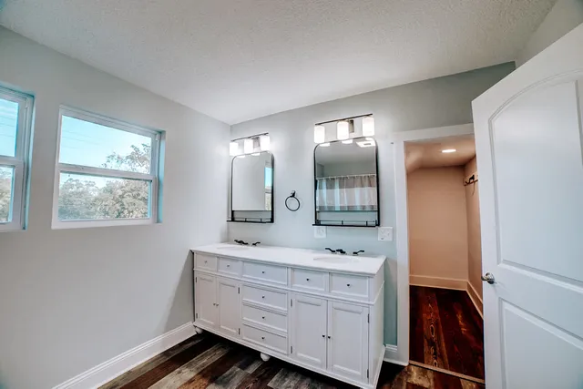 an empty room with a chandelier