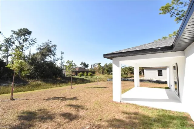 a view of a house with a park