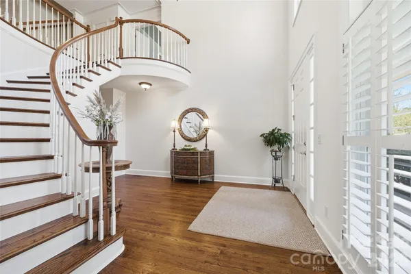 a view of entryway with wooden floor