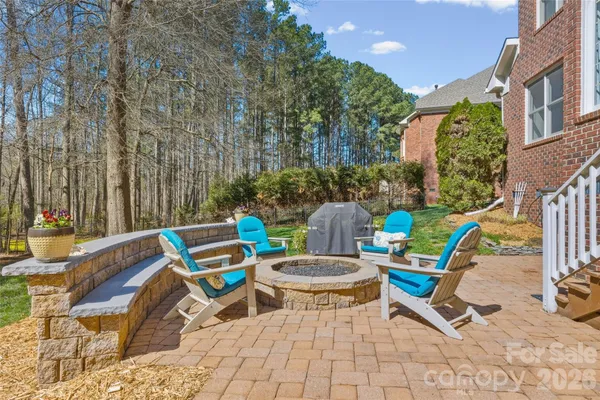 a blue and white sitting area with some trees