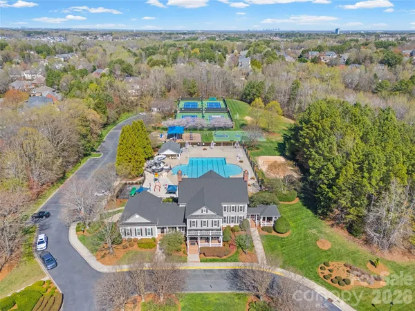 an aerial view of a house with swimming pool