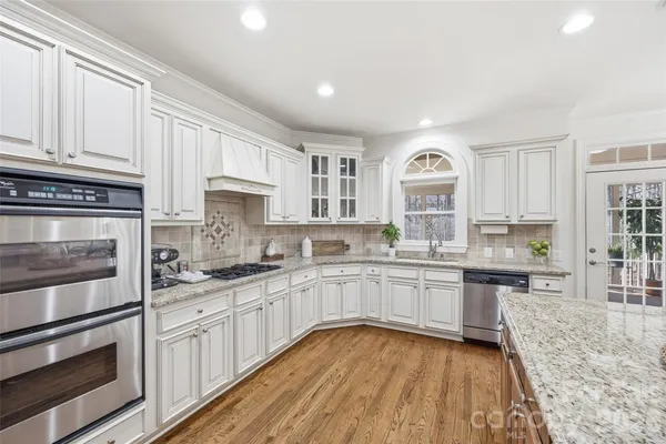 a large kitchen with cabinets