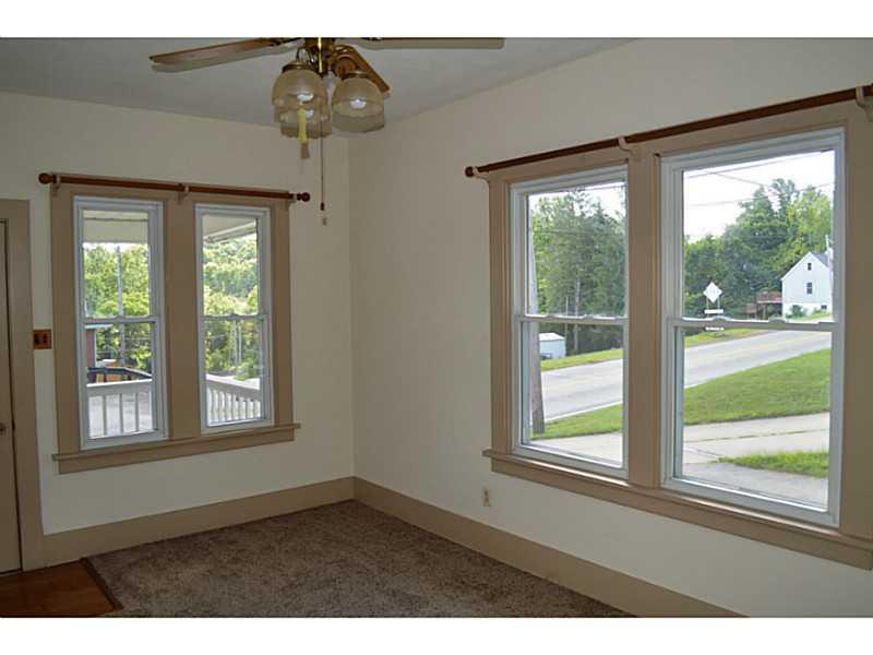 3129 Mount Morris Road Waynesburg, PA 15370 - Photo 5 of 19 Living Room. Ceilings and large windows makes this house bright !