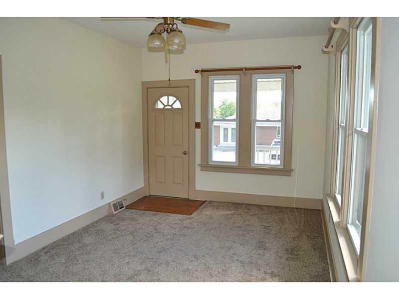 3129 Mount Morris Road Waynesburg, PA 15370 - Photo 6 of 19 Living Room. Covered front porch off the living room.