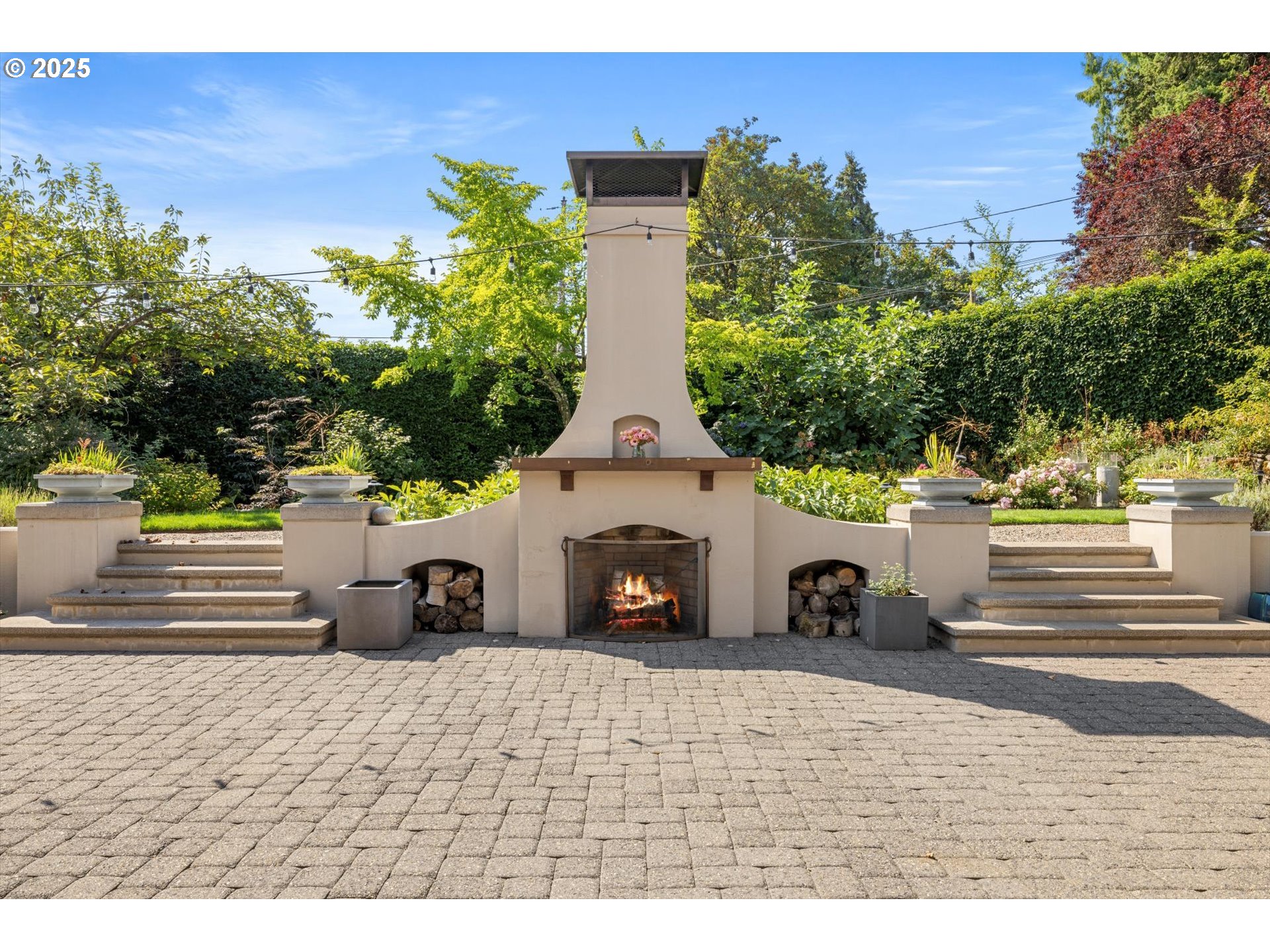 1948 Southwest Terrace Drive Portland, OR 97201 - Photo 11 of 48 a view of a terrace with a bench and fire pit