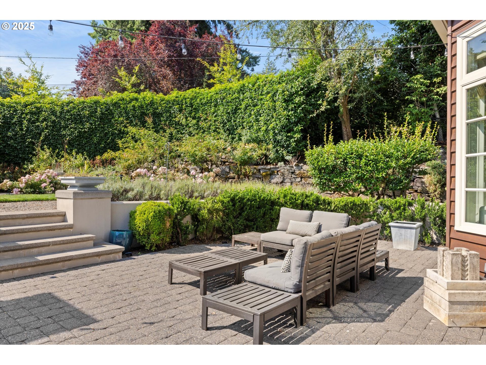 1948 Southwest Terrace Drive Portland, OR 97201 - Photo 12 of 48 a view of a patio with table and chairs and potted plants