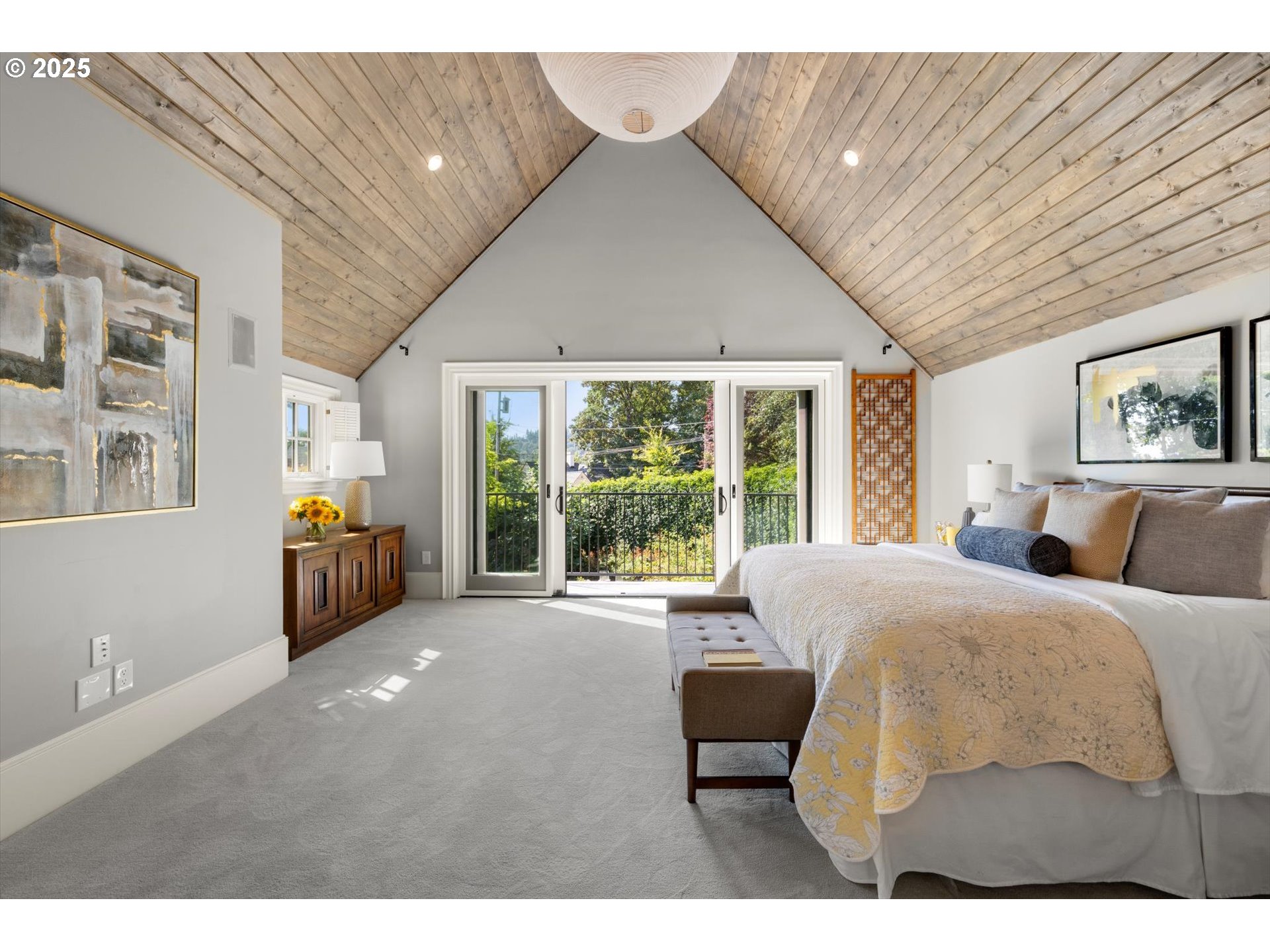 1948 Southwest Terrace Drive Portland, OR 97201 - Photo 15 of 48 a bed room with a bed and a large window